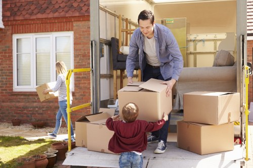 Removal team protecting furniture during a Brent move