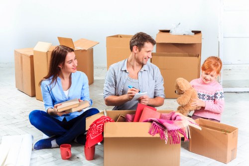 Removal van and packed boxes for a local Brent move