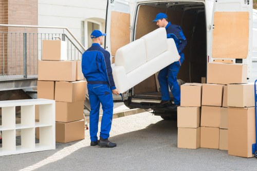 Man with a van loading furniture in Brent