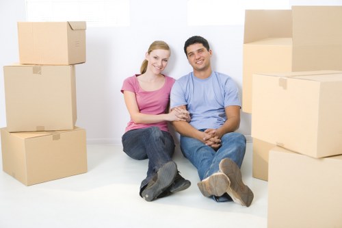 Student packing belongings for a move in Brent