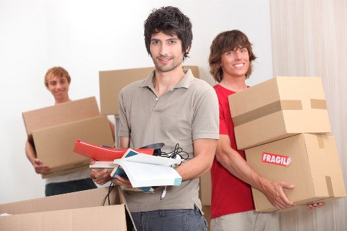 Careful loading of household furniture during a Brent home relocation
