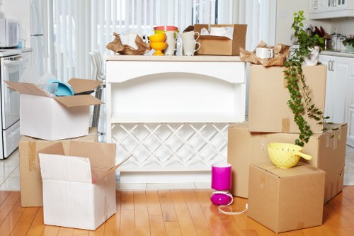Furniture pick-up service removing a sofa in Brent
