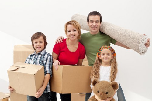 Unpacking household items into a new home with professional moving support in Brent