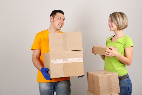 Packed moving boxes prepared for removal services in Brent