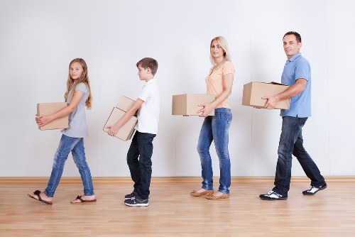 Packing boxes and furniture ready for house removals in Brent