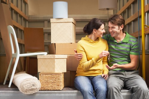 Careful furniture handling during a house move in Brent