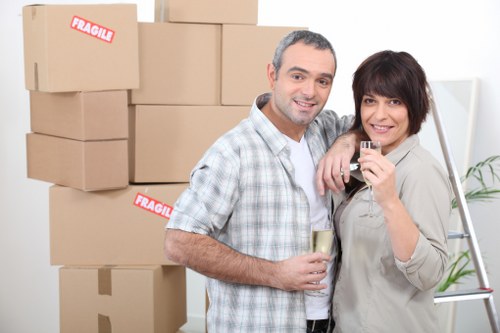 Cubic-yard pricing illustrated with furniture and boxes for a Brent house move