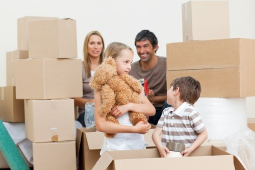 Professional movers handling a flat removal in Brent