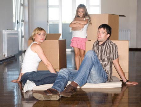 Moving team transporting furniture in Brent